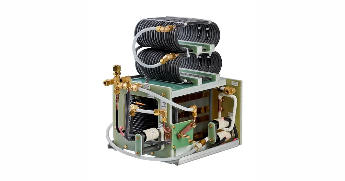 Custom magnetic coil assembly with copper tubing.